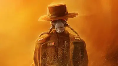 Cad Bane from The Book of Boba Fett stands in an orange haze, wearing a wide-brimmed hat and long coat, with red glowing eyes and braided facial cords.