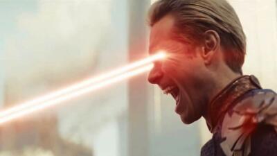 Homelander (The Boys) in profile, yelling as red heat-vision beams blaze from his eyes.