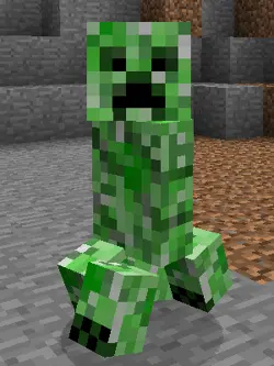 Creeper (Minecraft) standing on stone and dirt blocks in a Minecraft cave, green pixelated creature with a black frowning face.