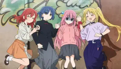Four girls from Bocchi the Rock! lie side-by-side on graffiti, holding hands and smiling — red, blue, pink and blonde-haired bandmates in casual clothes.