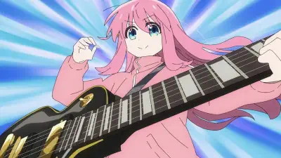 Bocchi the Rock! — pink-haired girl in a hoodie plays a black electric guitar in a dynamic low-angle shot with a blue radial burst background.