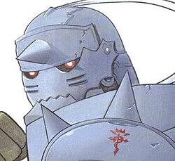 Alphonse Elric from Fullmetal Alchemist — close-up of his hulking suit of armor, helmeted face with narrow red eyes and the red Flamel symbol on his shoulder.